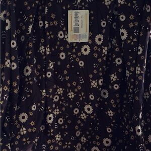 LulaRoe Madison purple midi skirt with white daisies